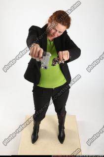 2012 01  NADIYA DUAL PISTOLS POSE1 00 A